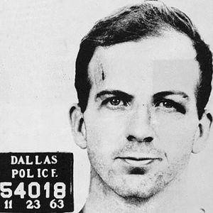 Lee harvey oswald's face when he was told he was charged with murder.